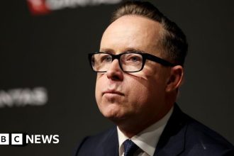 Qantas Ex-CEO’s Departure Pay Cut by Millions: What You Need to Know!