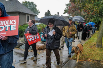 Faith and Snacks: Catholics Rally with Rosaries Outside Gretchen Whitmer’s Home Following Doritos Controversy